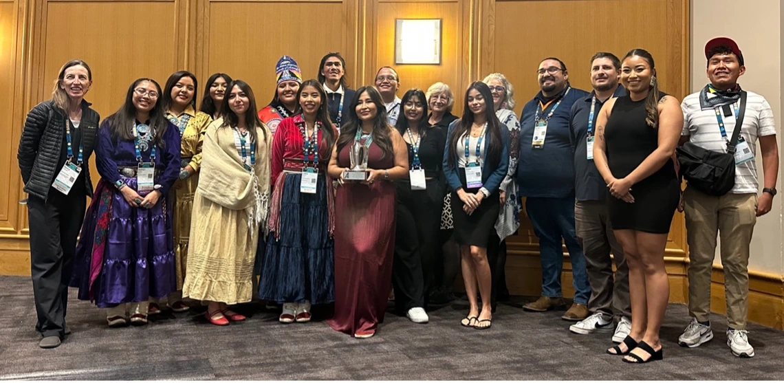 U of Arizona participants who attended the 2025 AISES National Conference’s closing banquet, with Dr. DeVore, 2025 AISES Most Promising Engineer / Scientist.