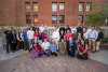 Attendees of the Women's Plaza event posing for a group photo